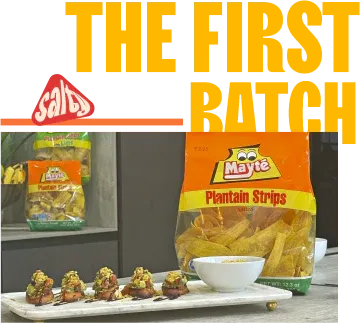 Mayte Plantain Strips bag beside a board of gourmet appetizers topped with plantain chips