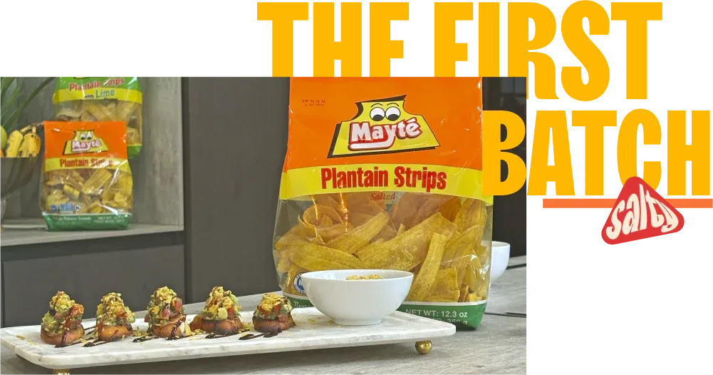 Mayte Plantain Strips bag beside a board of gourmet appetizers topped with plantain chips