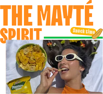 Woman with sunglasses joyfully eating Mayte plantain chips from a bowl, capturing the Mayte spirit