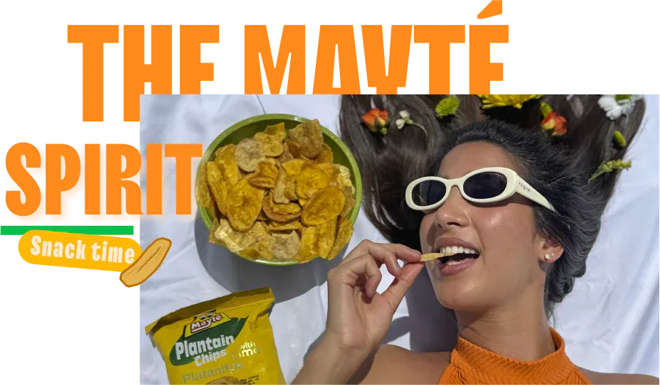 Woman with sunglasses joyfully eating Mayte plantain chips from a bowl, capturing the Mayte spirit
