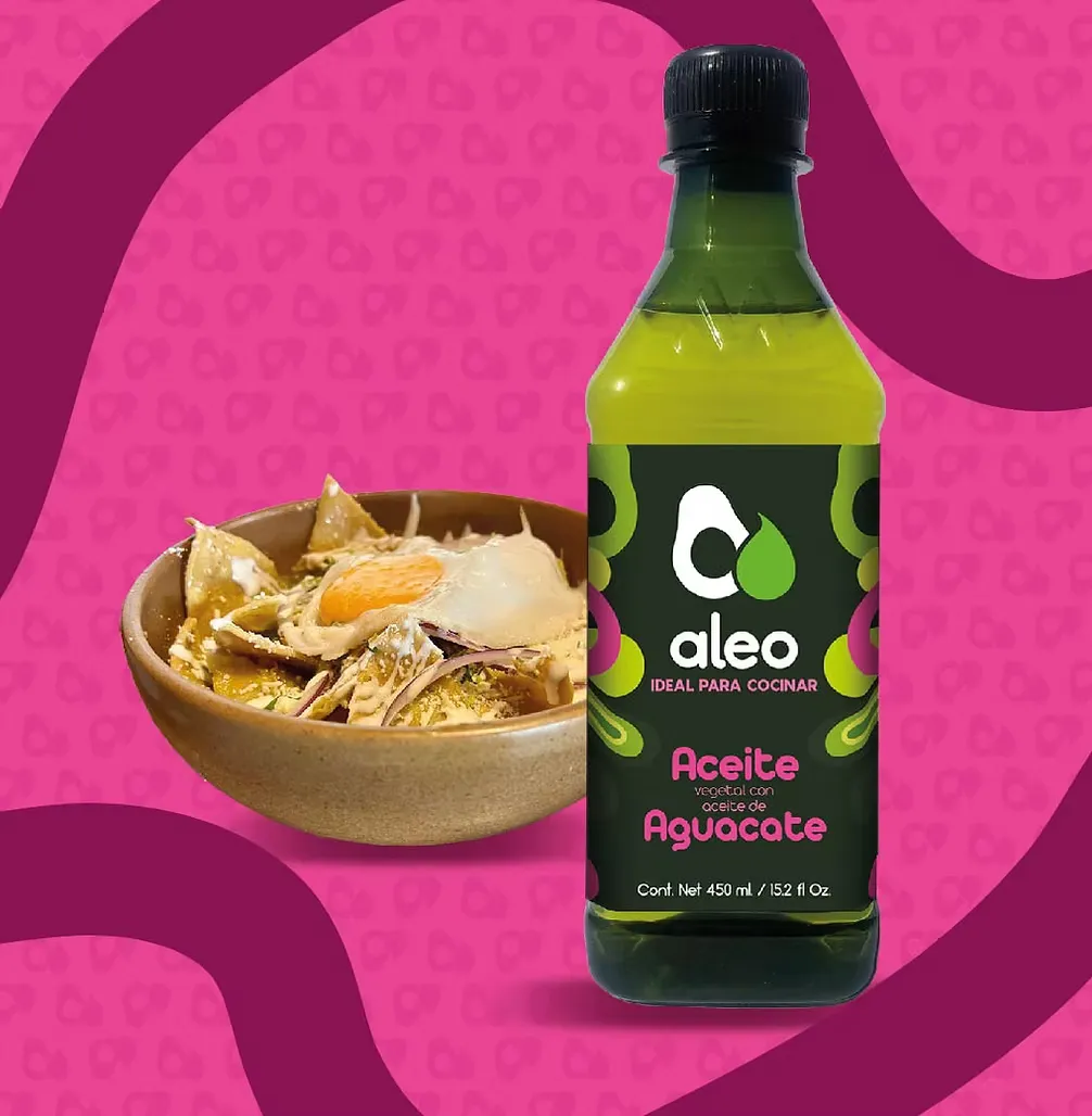 Aleo avocado oil 450ml bottle with bowl of soup on pink background