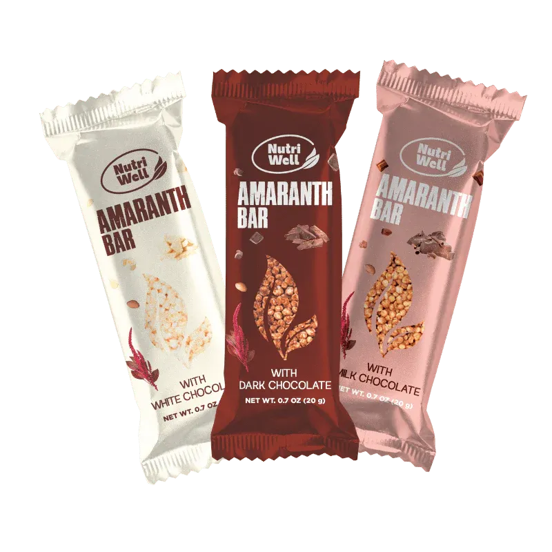 Three Nutri Well amaranth bars in white, dark, and milk chocolate varieties