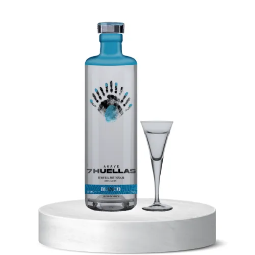 Blanco bottle with tasting glass on white pedestal