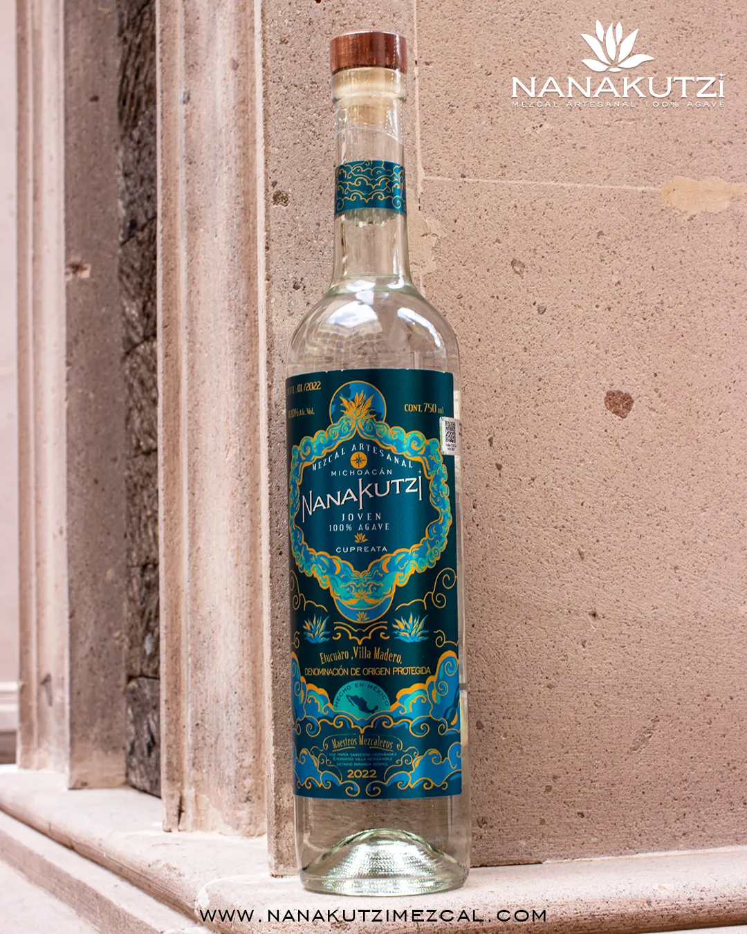 Nanakutzi Cupreata bottle on architectural stone window ledge