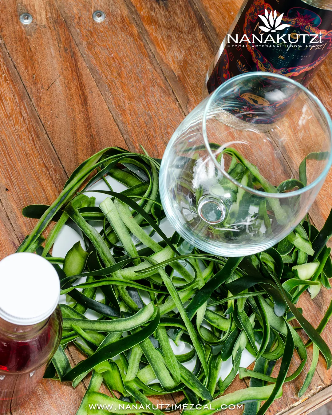 Overhead shot of Nanakutzi Espadín with cucumber ribbons and cocktail glass