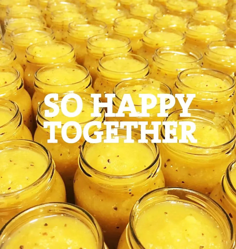 Freshly filled marmalade jars in artisan batch production