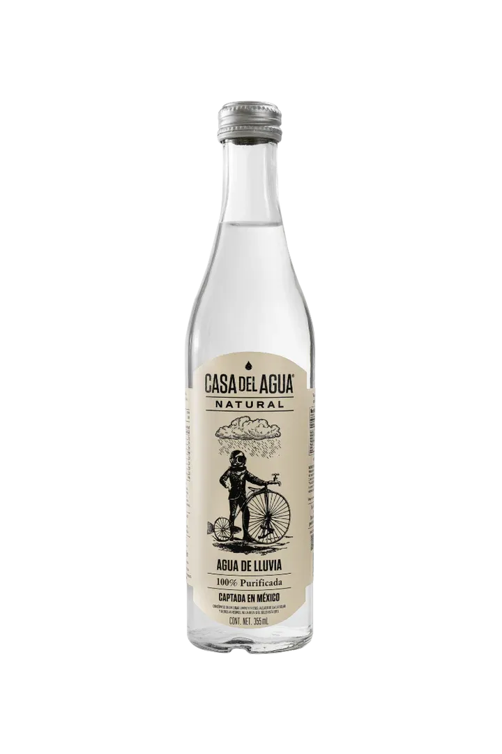 Casa del Agua Natural rainwater glass bottle on a clean studio background