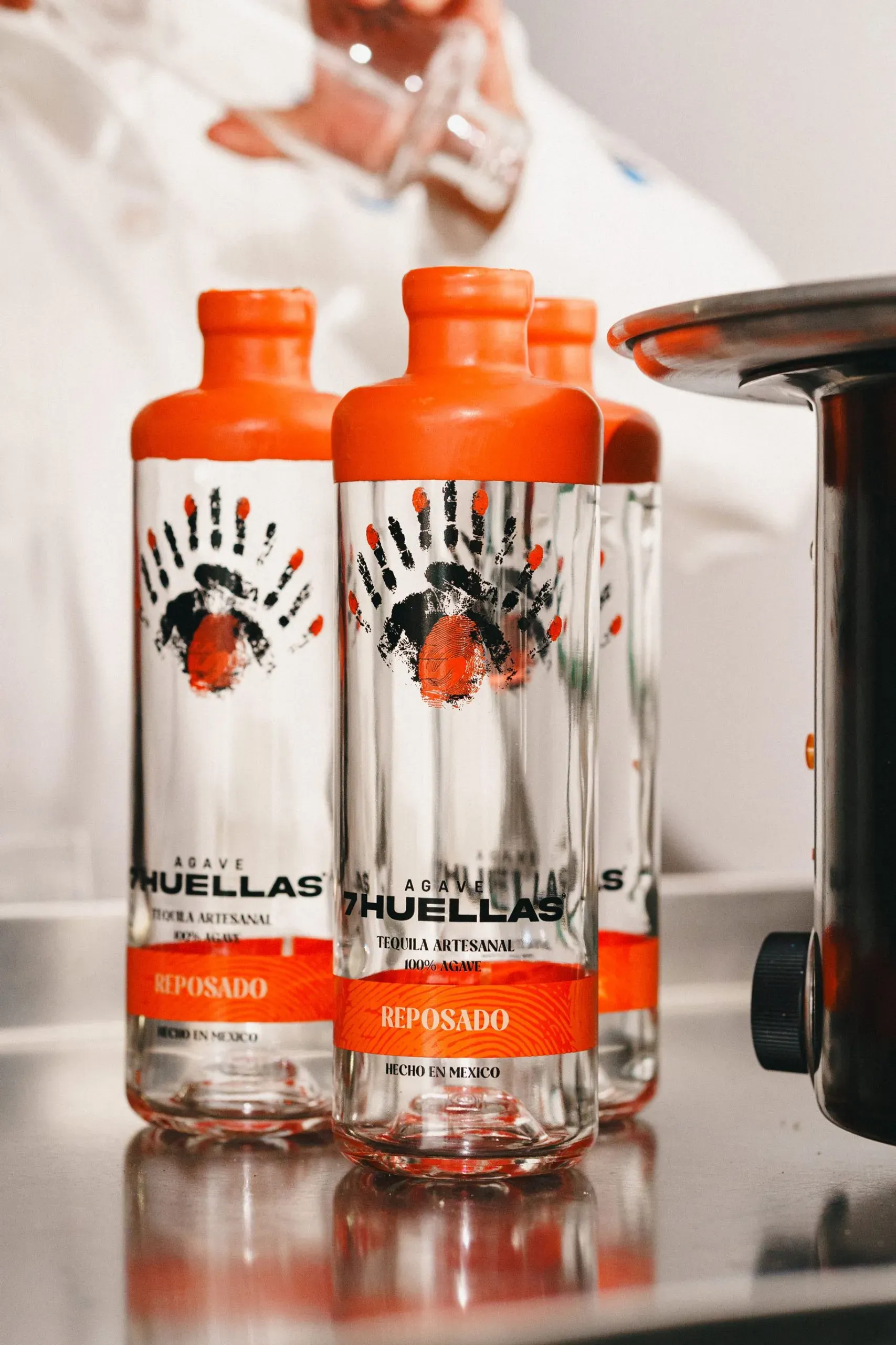 Reposado bottle on production bottling line