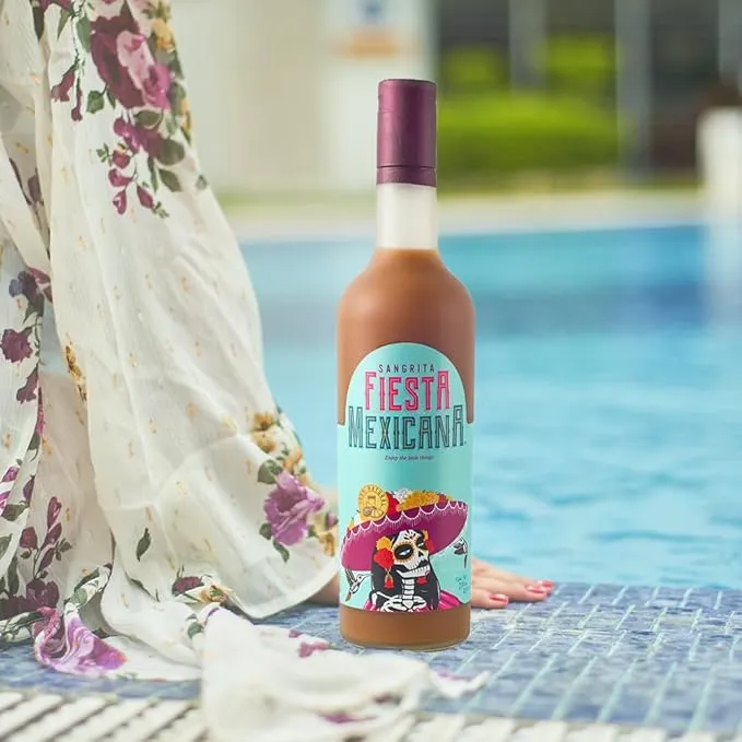 Sangrita bottle poolside with floral sarong